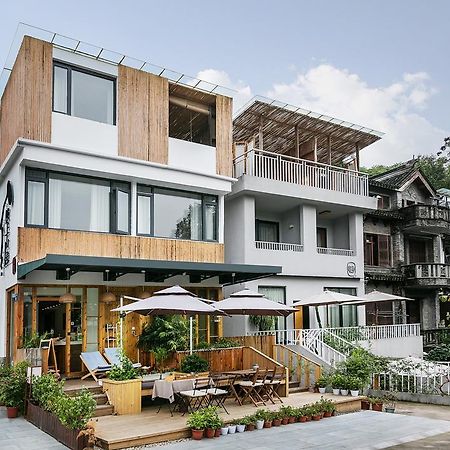 Hangzhou Puyu Travelling With Hotel Bagian luar foto