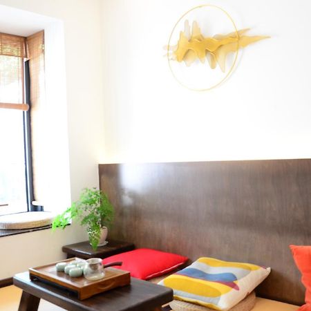 Hangzhou Puyu Travelling With Hotel Bagian luar foto