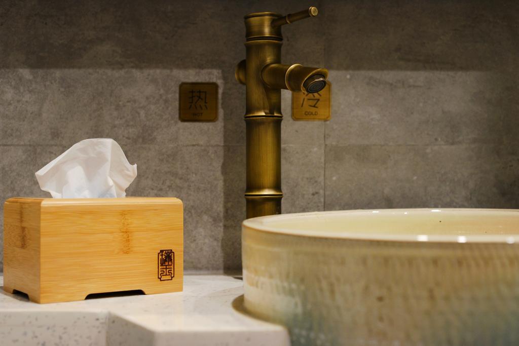 Hangzhou Puyu Travelling With Hotel Bagian luar foto