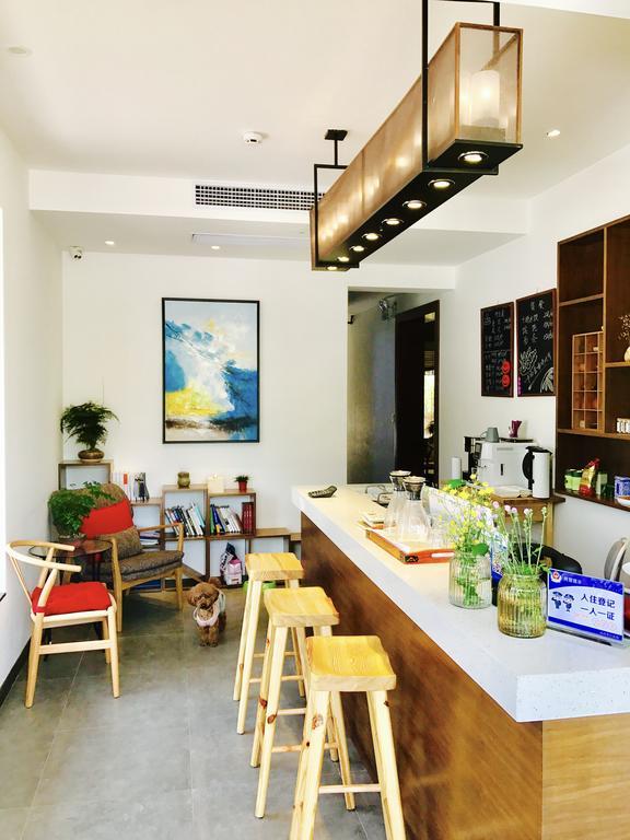 Hangzhou Puyu Travelling With Hotel Bagian luar foto