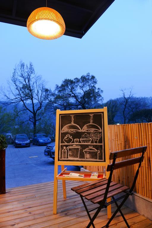 Hangzhou Puyu Travelling With Hotel Bagian luar foto