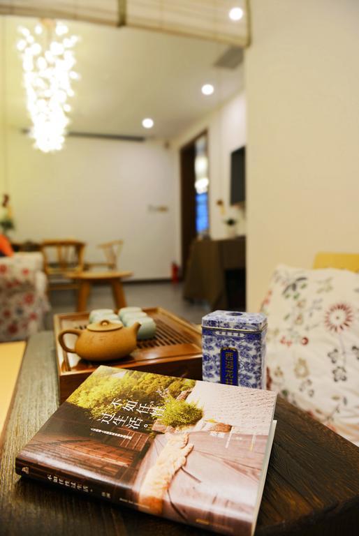 Hangzhou Puyu Travelling With Hotel Bagian luar foto