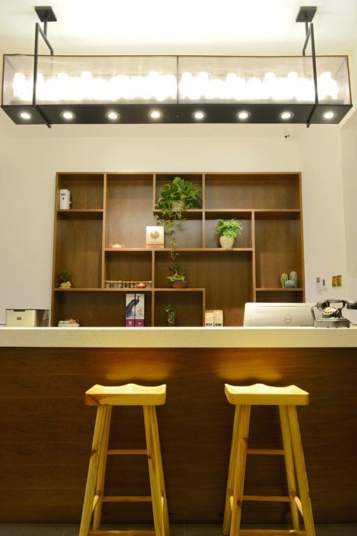 Hangzhou Puyu Travelling With Hotel Bagian luar foto
