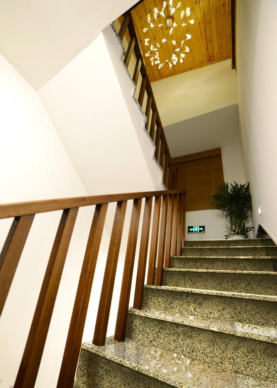 Hangzhou Puyu Travelling With Hotel Bagian luar foto