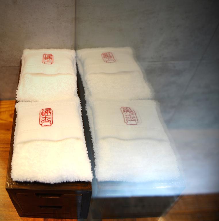 Hangzhou Puyu Travelling With Hotel Bagian luar foto