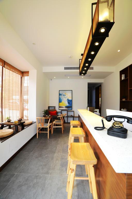 Hangzhou Puyu Travelling With Hotel Bagian luar foto