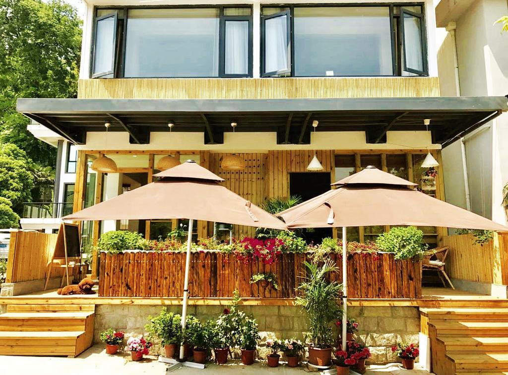 Hangzhou Puyu Travelling With Hotel Bagian luar foto