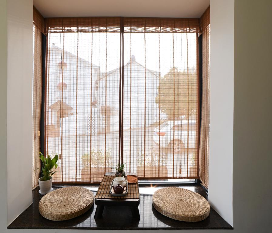 Hangzhou Puyu Travelling With Hotel Bagian luar foto