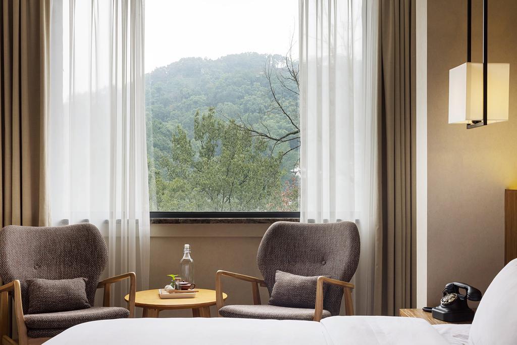 Hangzhou Puyu Travelling With Hotel Bagian luar foto