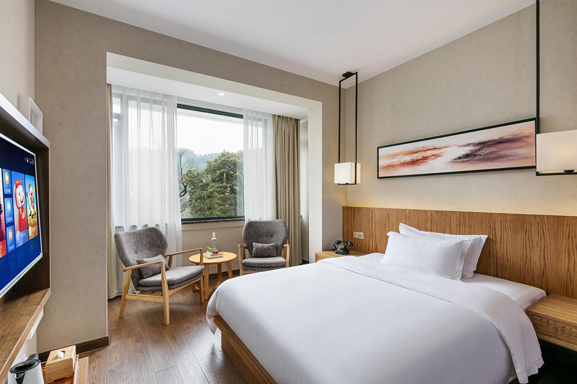 Hangzhou Puyu Travelling With Hotel Bagian luar foto