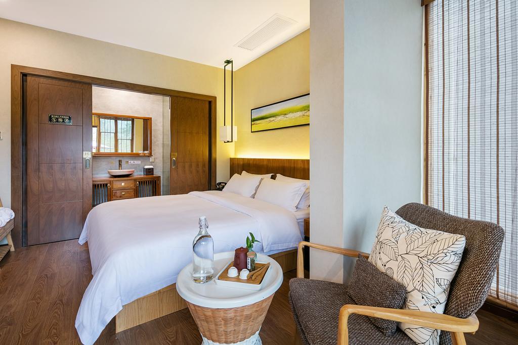 Hangzhou Puyu Travelling With Hotel Bagian luar foto