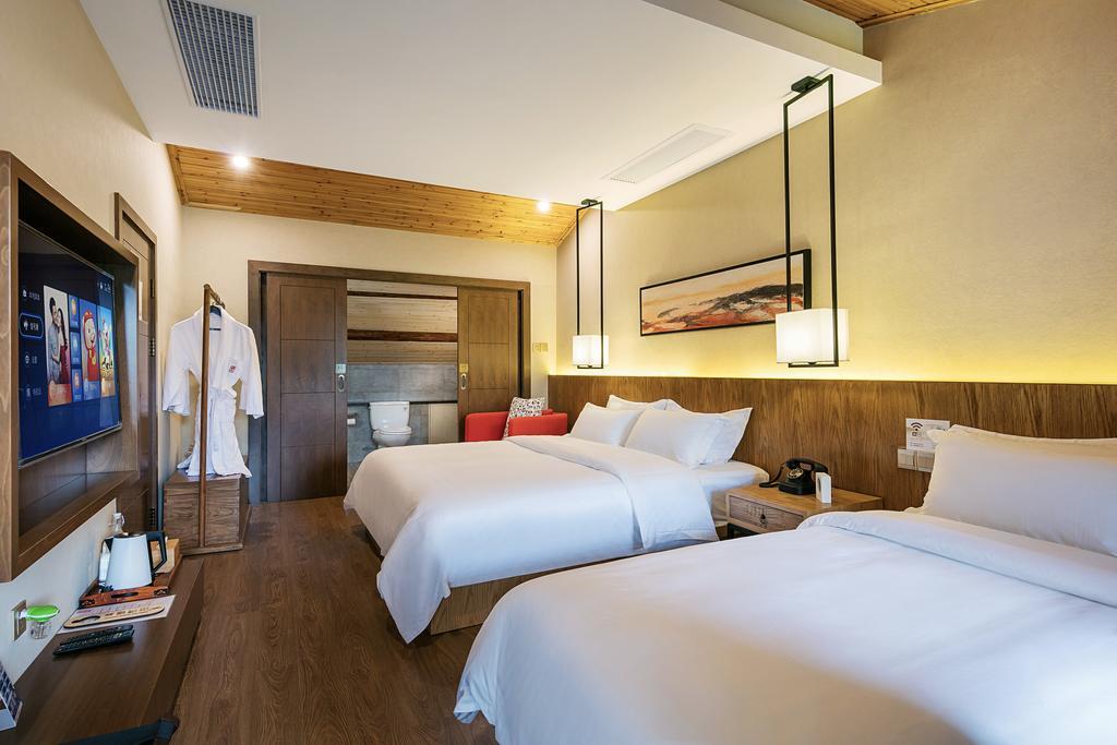 Hangzhou Puyu Travelling With Hotel Bagian luar foto
