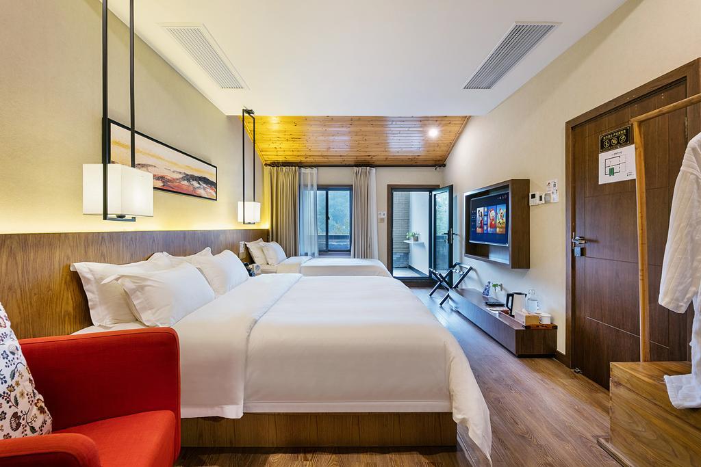 Hangzhou Puyu Travelling With Hotel Bagian luar foto