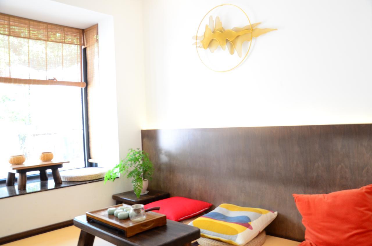 Hangzhou Puyu Travelling With Hotel Bagian luar foto