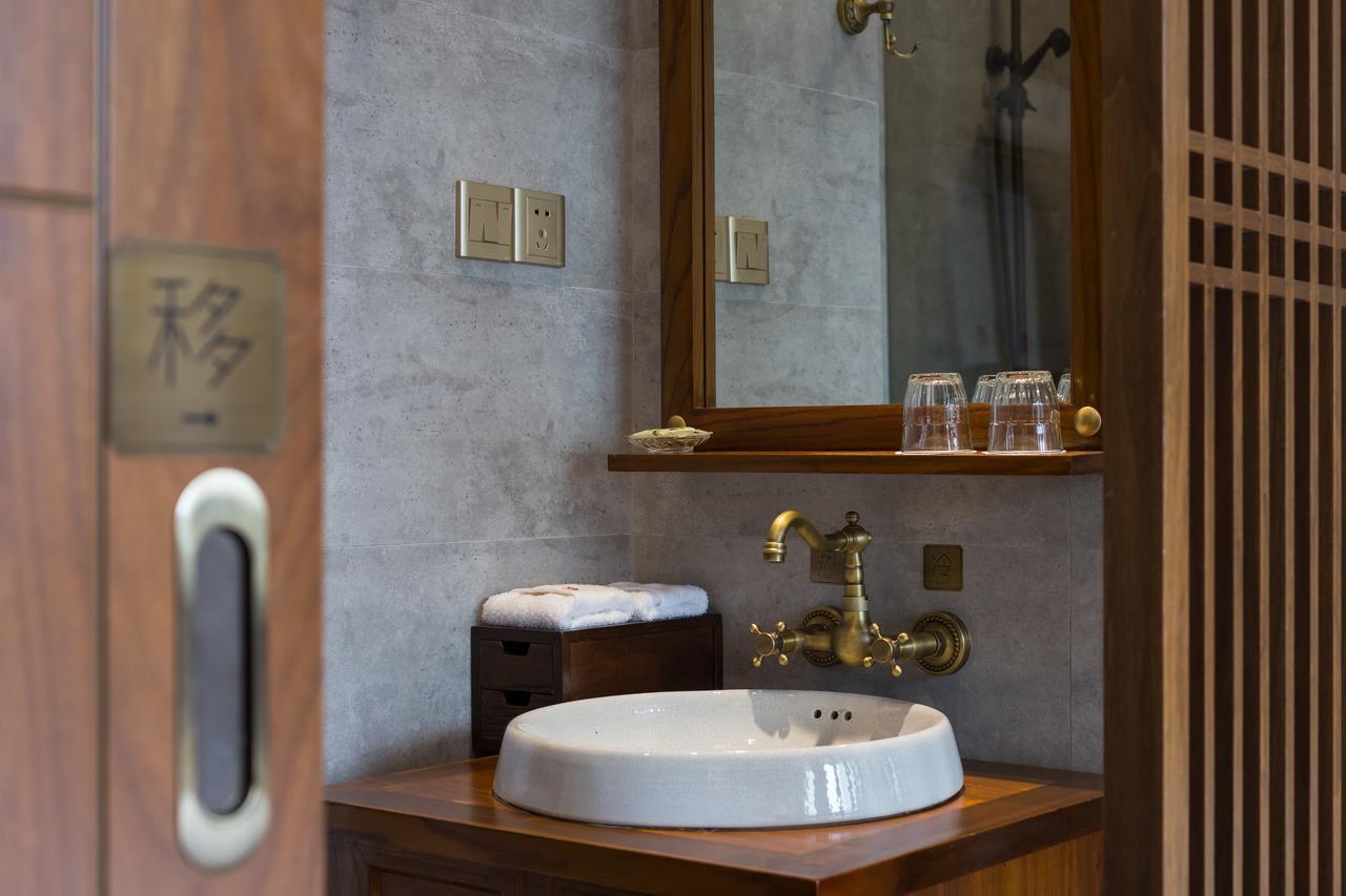 Hangzhou Puyu Travelling With Hotel Bagian luar foto